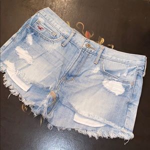 Mid waist destroyed jean shorts